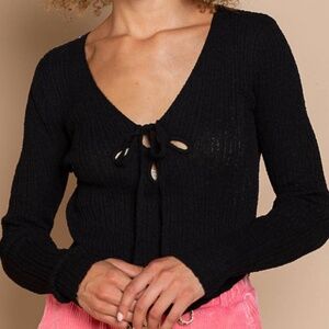 Cropped fitted thin sweater with center cut and and self tie ribbon